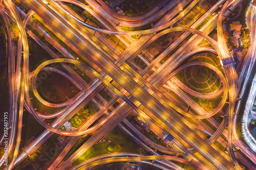 Photography Aerial view of highway at rush hour at night time with car trail and traffic