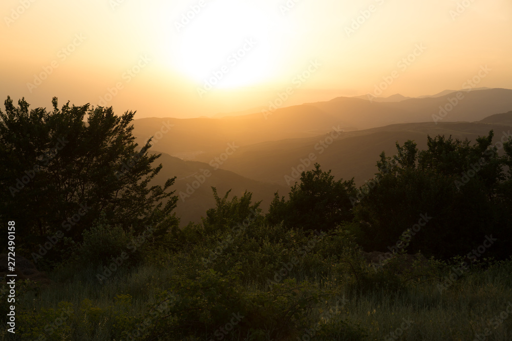 Beautiful landscape in the mountains with the sun at dawn. Mountains at the sunset time. Azerbaijan Caucasus Mountains. Agsu pass. Baskal. Nature