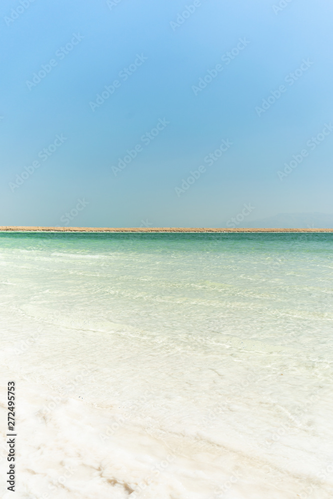 The Dead Sea located in Israel where people to go to swim, float, vacation, and relax in the sun while enjoying its healing properties. The Dead Sea located in Israel where people to go to swim, float, vacation, and relax in the sun while enjoying its healing properties.