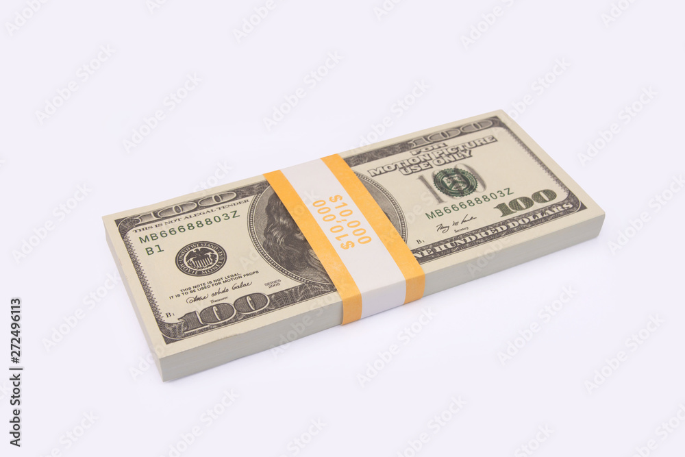 100 US Dollar bills bundles stack isolated on white background with clipping path 100 US Dollar bills bundles stack isolated on white background with clipping path