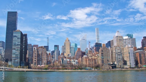 View of Mid-town of Manhattan from Roosevelt Island in New York © bleung