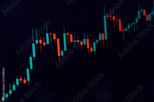 Forex concept - Candlestick chart red green in financial market for trading on black color background