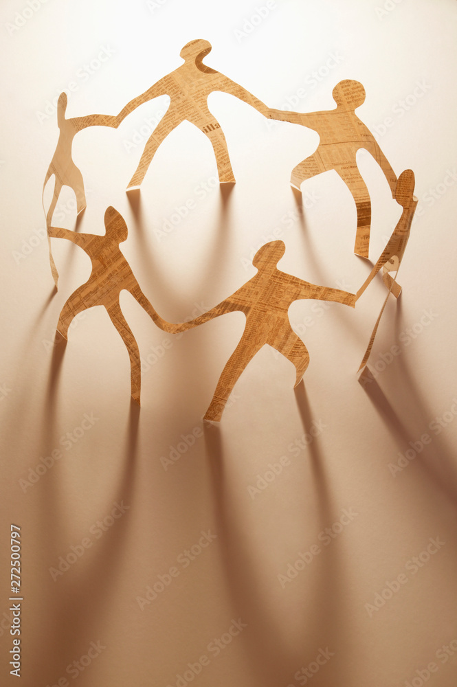 Paper dolls holding hands Stock Photo Adobe Stock