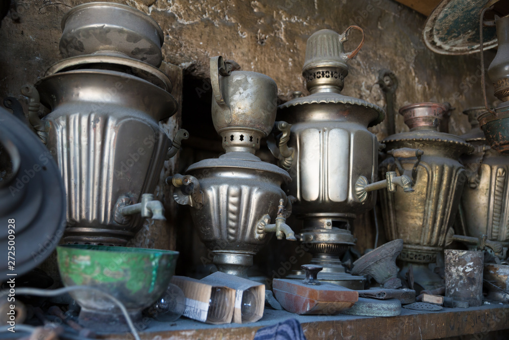 Coppersmith workshop and hand made copper things, Lahich, Azerbaijan. Interior of coppersmith workshop in the village. Coppersmith workshop and hand made copper things, Lahich, Azerbaijan. Interior of coppersmith workshop in the village.