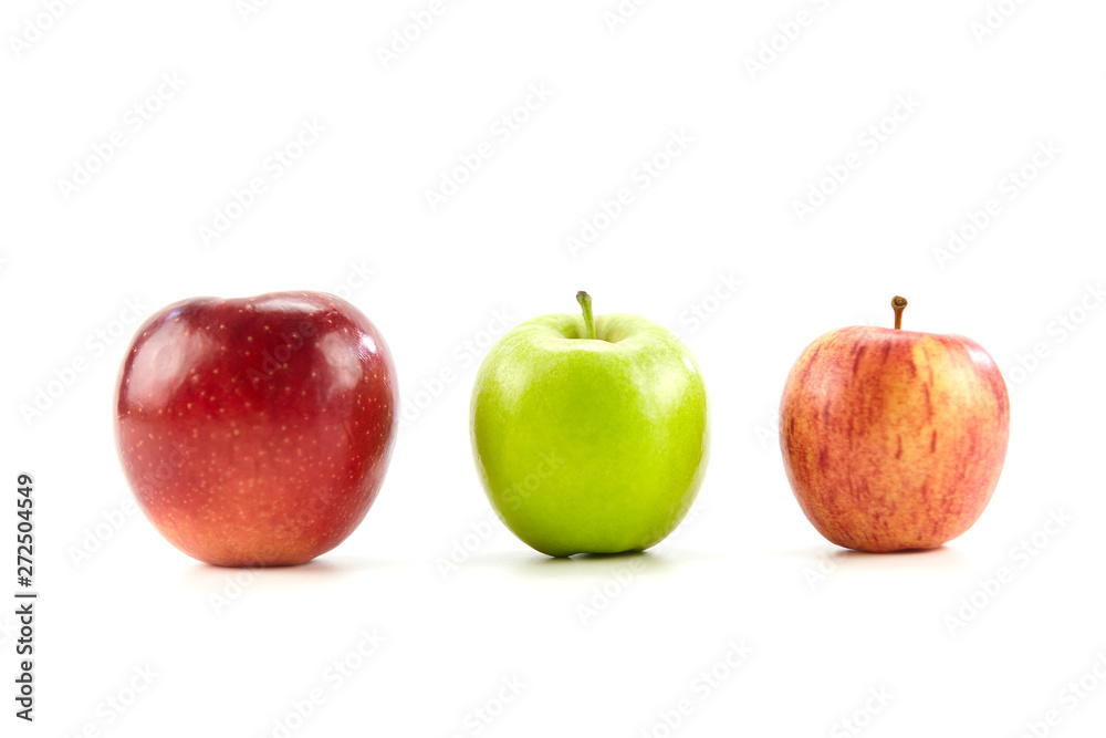three different apples on white background three different apples on white background
