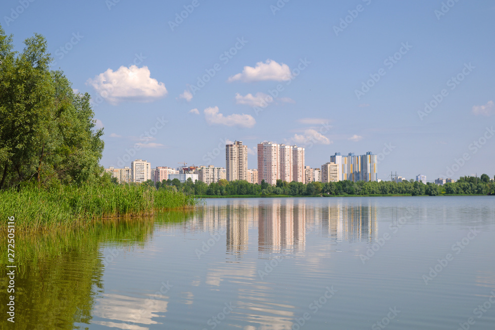 View across the lake at home in the city near nature.