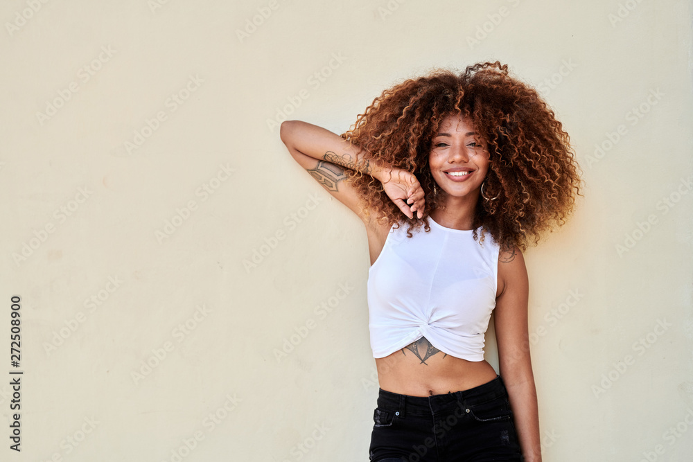 Lovely woman with frizzy hair and tattooes. Lovely woman with frizzy hair and tattooes.