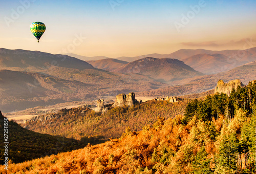 Aerial view from above to theair balloon and mountains in autumn, Belogradchik photo