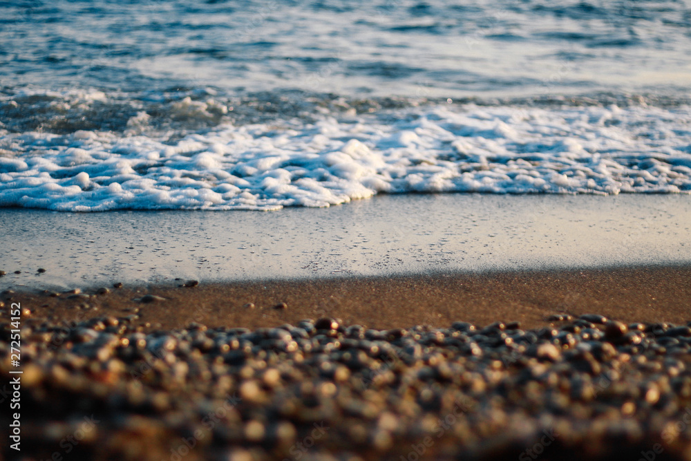 Sea wave and seashore in the rays of the sun. Sea wave and seashore in the rays of the sun.