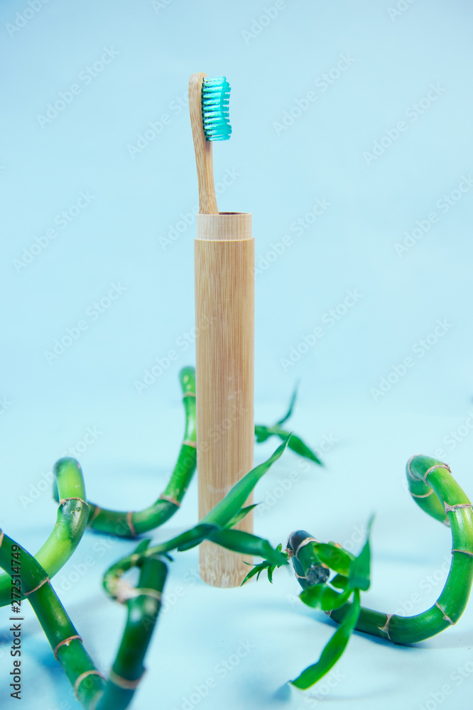 Flat lay composition with bamboo toothbrush and space for text