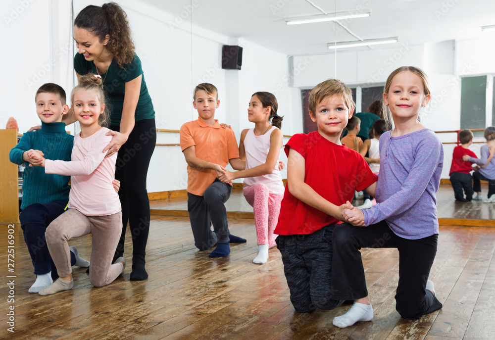 Fototapeta premium Children studying of partner dance at dance school