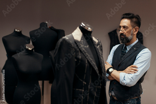 Portrait of a man fashion designer in atelier