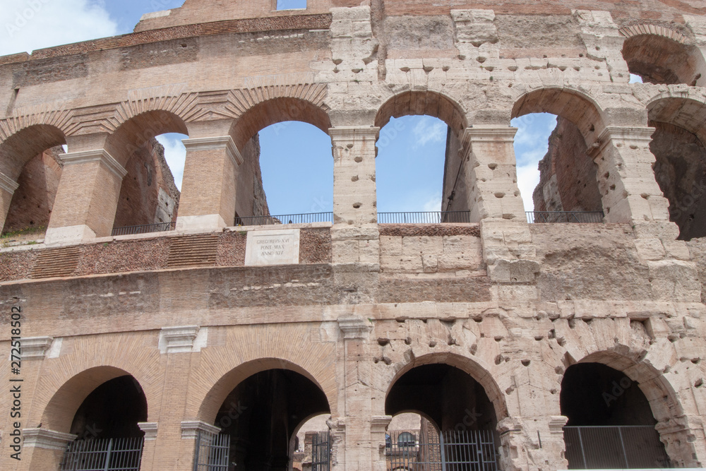Side by side of original structure and Restoration of Colosseum In Rome
