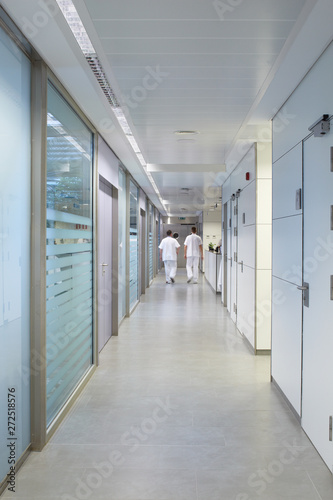 Hospital hall with medical staff photo