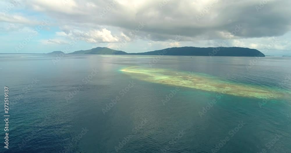 Small coral island near Raja Ampat . West Papua, Indonesia. Small coral island near Raja Ampat . West Papua, Indonesia.