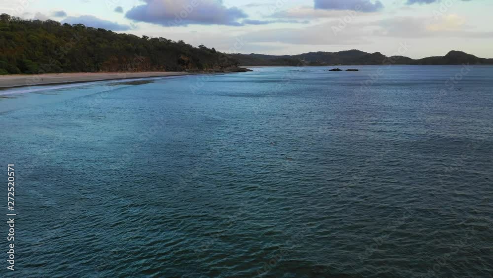 Aerial Forward: Dark Blue Ocean With Forest Covered Hills On Shore - El Gigante, Nicaragua Aerial Forward: Dark Blue Ocean With Forest Covered Hills On Shore - El Gigante, Nicaragua