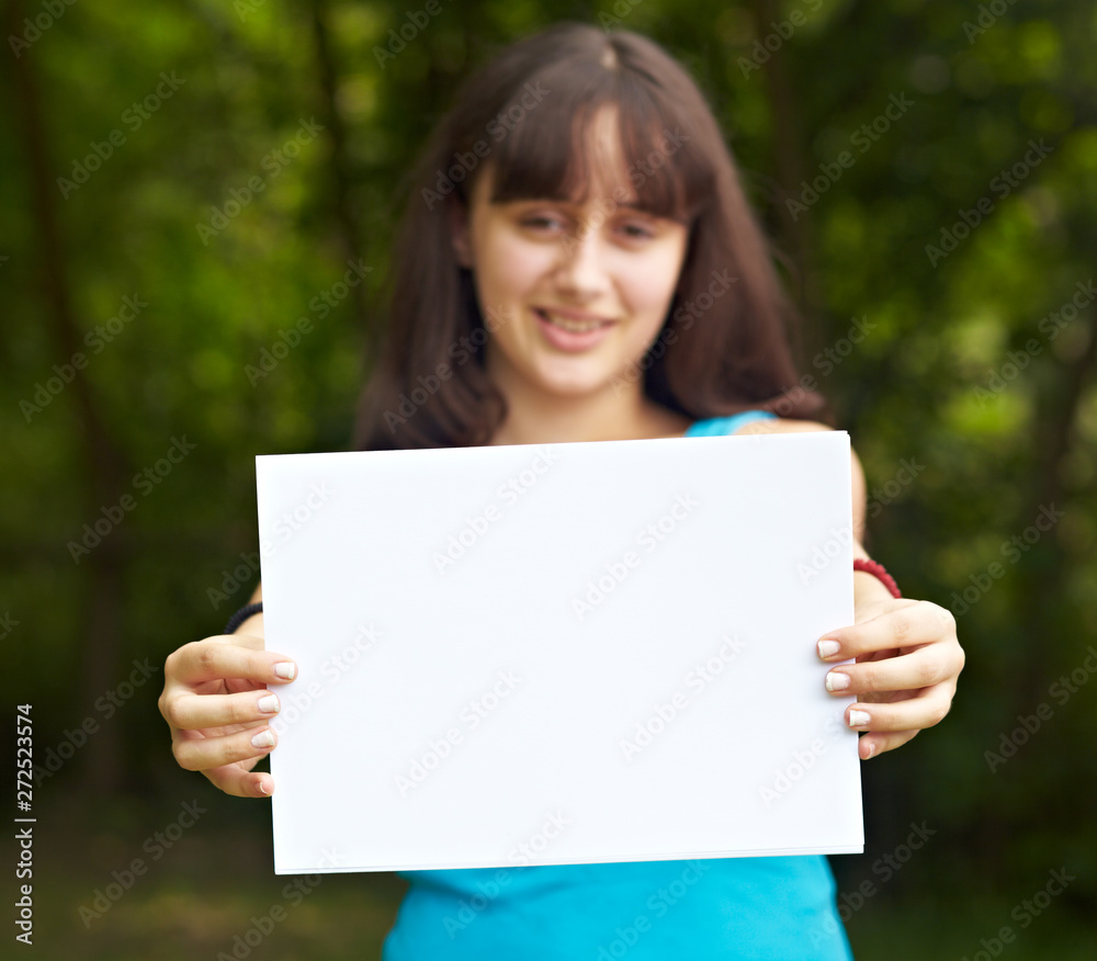 beautiful teenage girl holding blank message sign beautiful teenage girl holding blank message sign