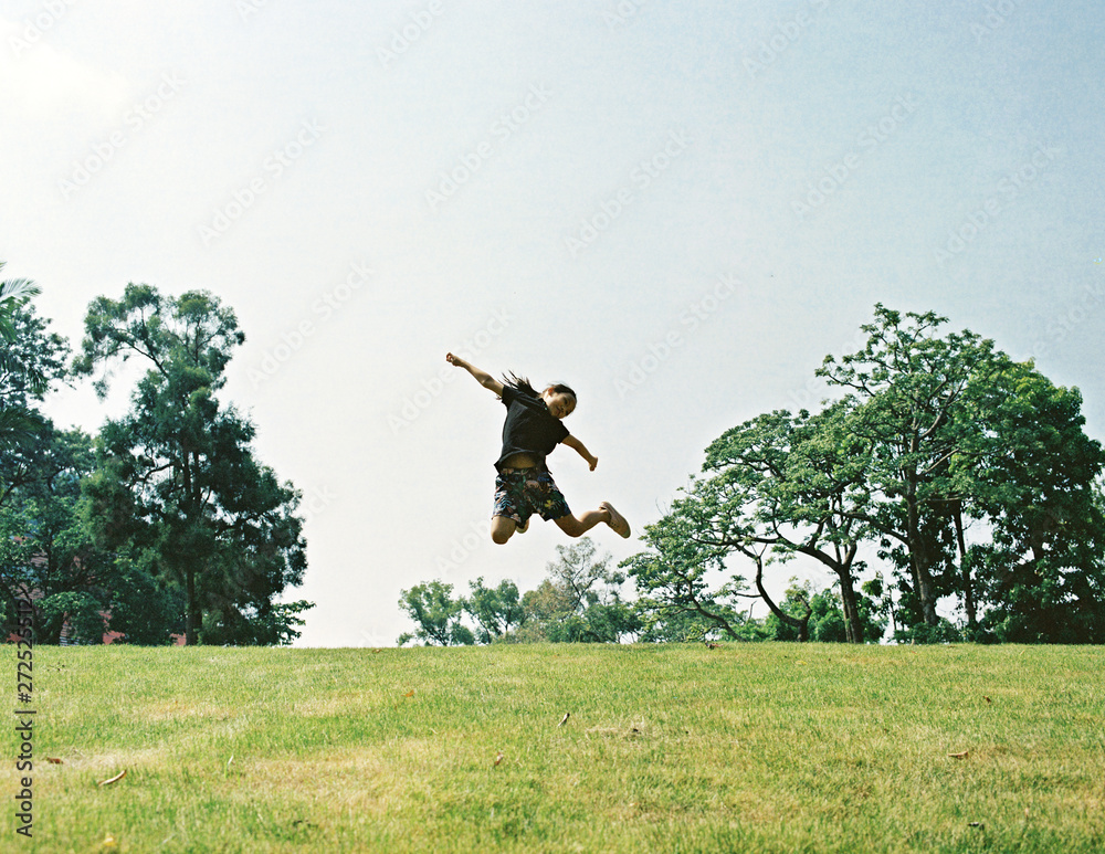 Cute Asian girl in the nature park. Shooting by 120 film Cute Asian girl in the nature park. Shooting by 120 film