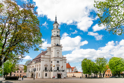 Town Hall White Swan in the center of Kaunas at the Town Hall Square in Lithuania in the spring against a blue sky with cirrus clouds. Kaunas, Lithuania – May, 2019