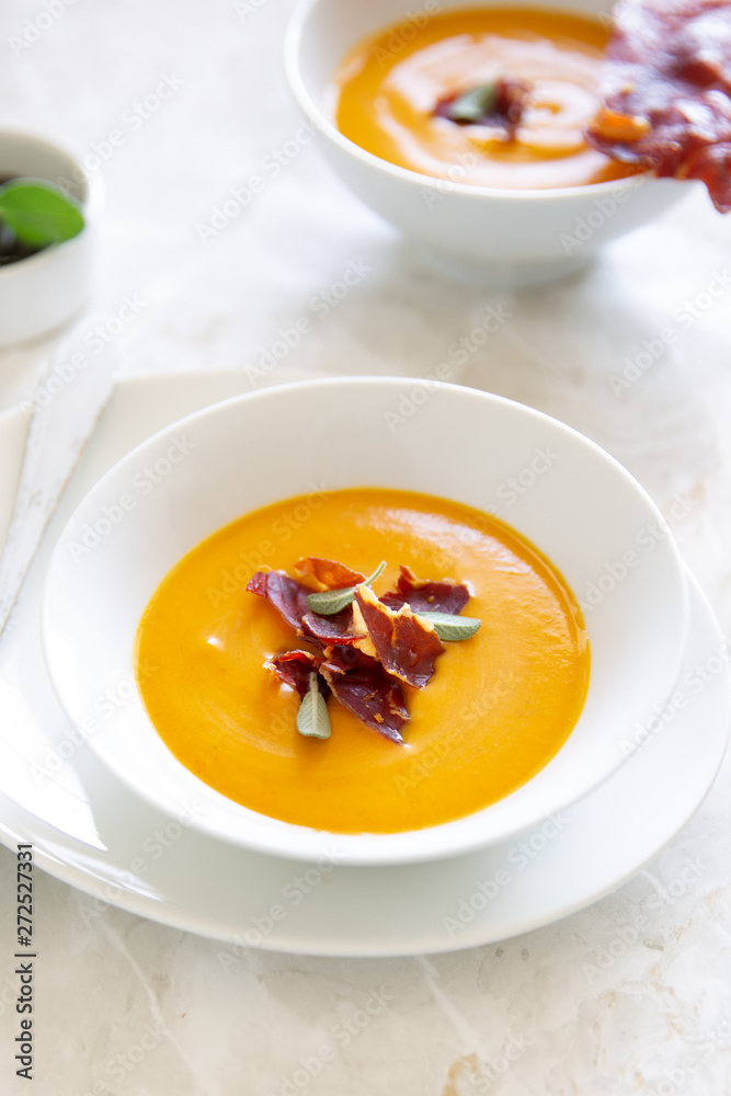 Roasted pumpkin soup with ham chips Roasted pumpkin soup with ham chips