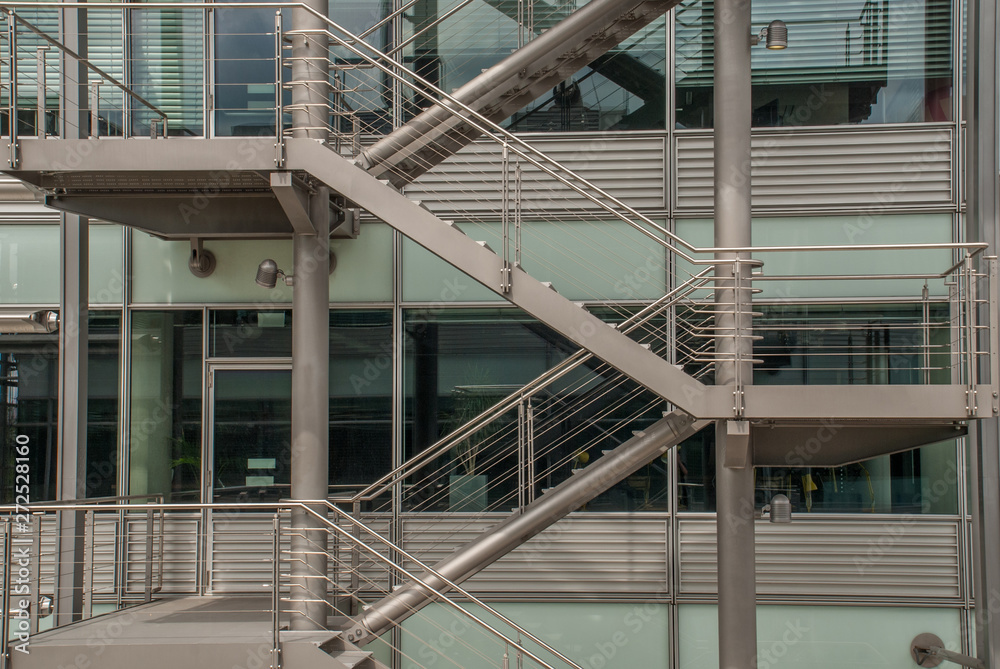 Naklejka premium Staircase and windows of modern office building. Contemporary corporate business architecture.