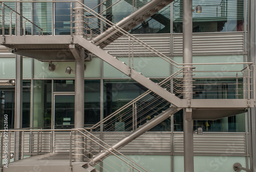 Staircase and windows of modern office building. Contemporary corporate business architecture.