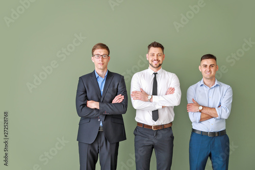 Team of businessmen on colo...
