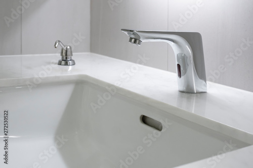 Modern faucet with marble washbasin sink interior contemporary