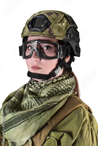 Portrait of fully equipped young military soldier woman in helmet, glasses and scarf, isolated photo. © syberianmoon