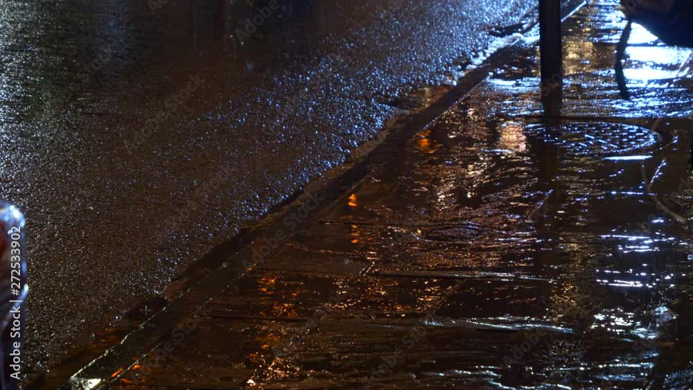Beautiful scene of a rainy night and the lights and car headlights reflecting in the water. New Orleans USA. Flat plane. High angle shot