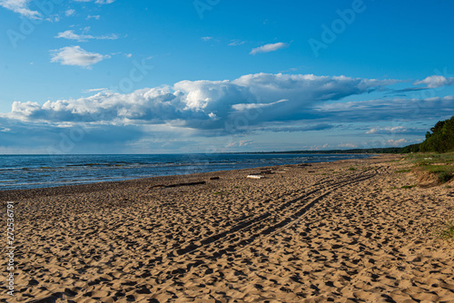 blue sky with white clouds over countryside landscape