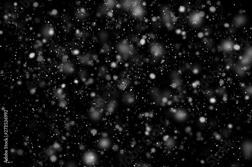 Fototapeta The texture of white snow during a snowfall