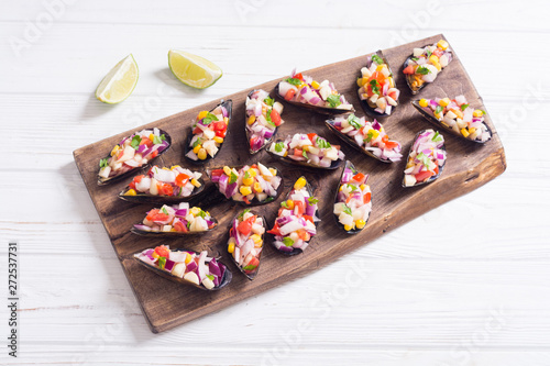 Traditional  Peruvian food background with mussels photo