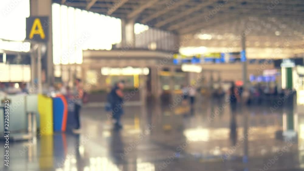 blurred background. people at the airport blurred background. people at the airport