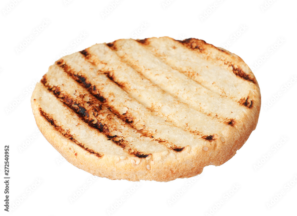 Half of grilled burger bun isolated on white Half of grilled burger bun isolated on white