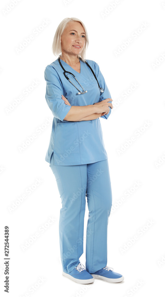 Full length portrait of female doctor in scrubs isolated on white. Medical staff Full length portrait of female doctor in scrubs isolated on white. Medical staff