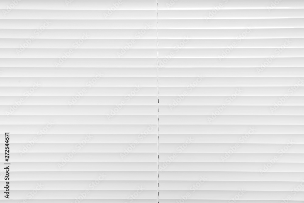 Window with closed white horizontal blinds as background Window with closed white horizontal blinds as background