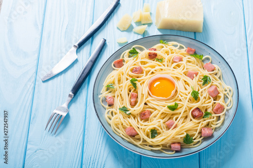 Itslian pasta carbonara with sausage and egg photo