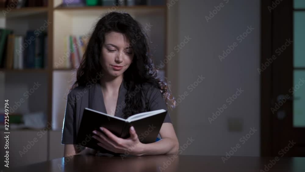 attractive female learning with literature in school attractive female learning with literature in school