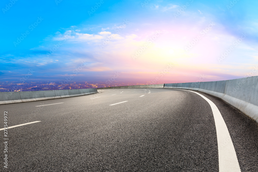Naklejka premium Empty highway road and modern city skyline in Shanghai,China