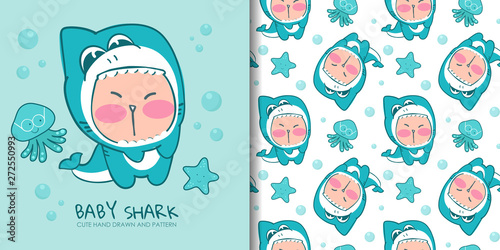 Hand drawn lovely kid in costume of shark with seamless pattern.