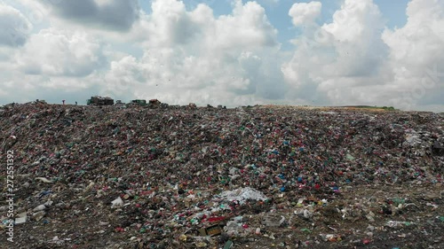 Plastic pollution crisis. Trash sent to Malaysia for recycling is instead dumped in a giant garbage mountain photo