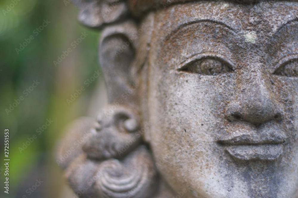 Close up of a beautiful Balinese stone statue