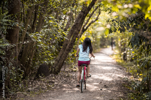 Wallpaper Mural Blurred background of people who are cycling fast, exercising in the park in the morning - evening, the atmosphere is surrounded by nature. Torontodigital.ca