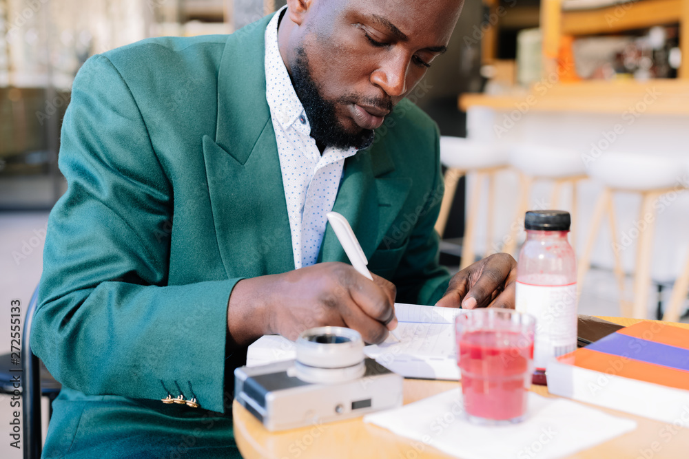 Business man filling up documents Business man filling up documents