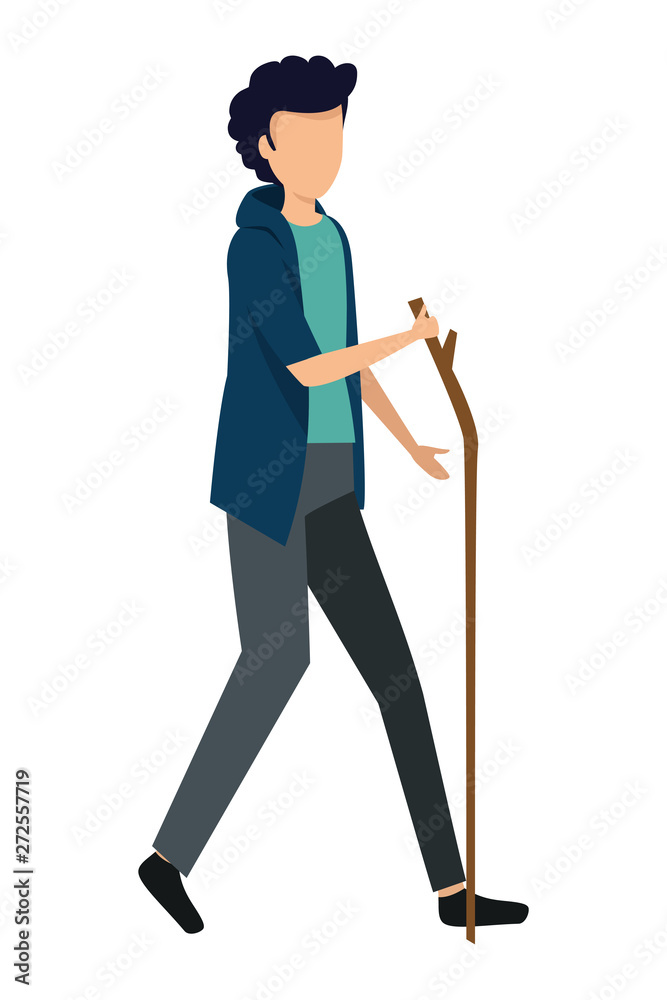 happy young man walking with wood stick happy young man walking with wood stick