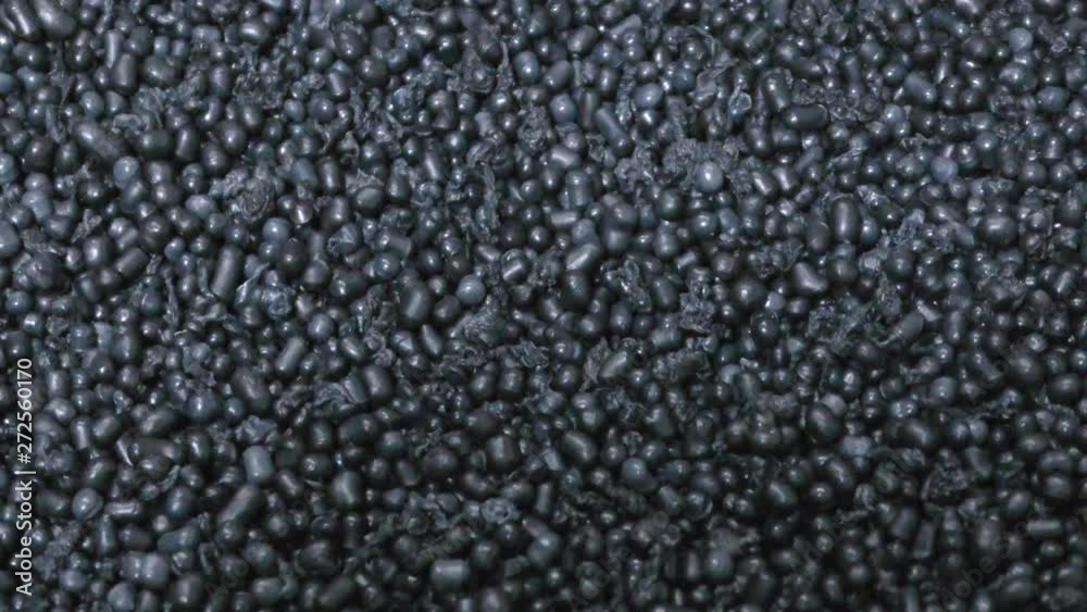 Raw plastic material black polymer granules made from recycled plastic, scrap pieces for plastic production Raw plastic material black polymer granules made from recycled plastic, scrap pieces for plastic production