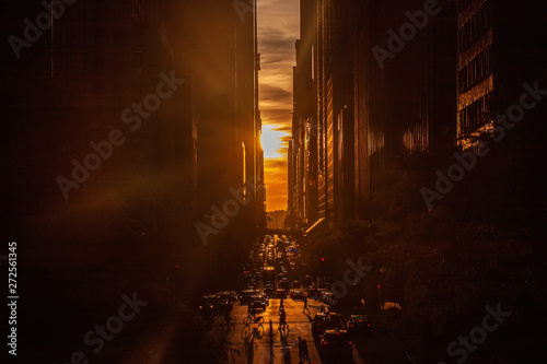 Sunset over 42nd Street with the colorful lights of traffic through Midtown Manhattan  New York City NYC