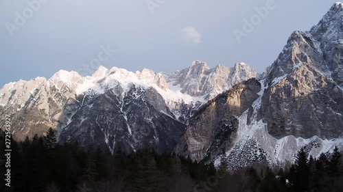 Driving and looking over the highest mountain pass in Slovenia of Vrsic. Triglav National Park, Julian Alps, Slovenia Trenta Valley photo