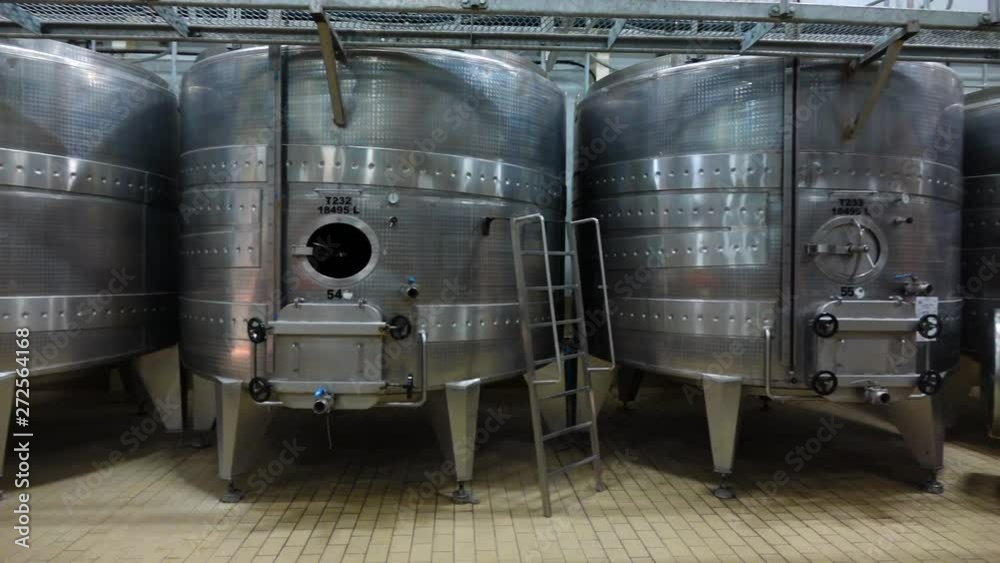 Stainless steel tanks for wine maturation in wine cellar Stainless steel tanks for wine maturation in wine cellar